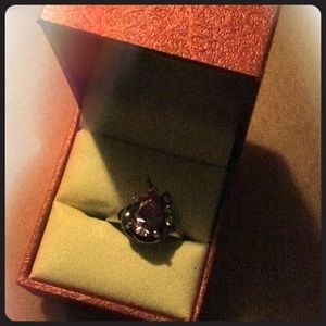 A ring that is real sterling silver and amethyst